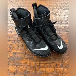 Nike cleats sz 10  AQ7722-001 black with white swoosh.